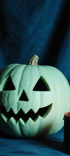 Candles And Halloween Pumpkins
